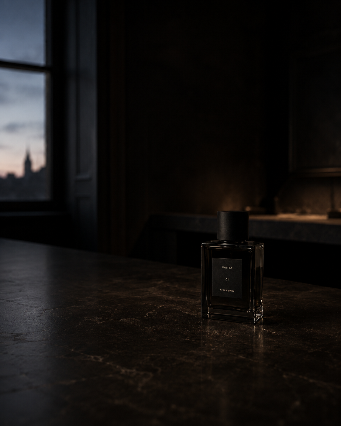 The VANTA bottle on dark marble beside a window as the city edges toward dawn